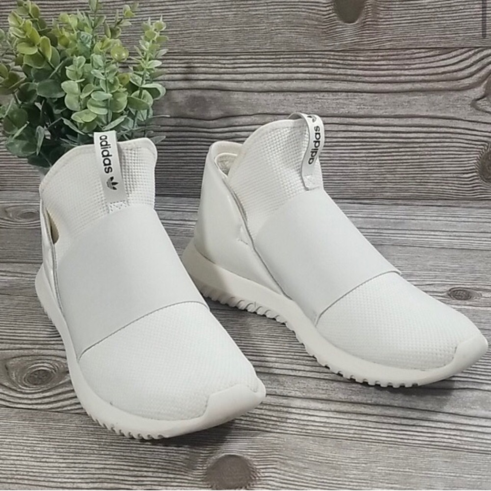White Adidas Tubular Slip Ons